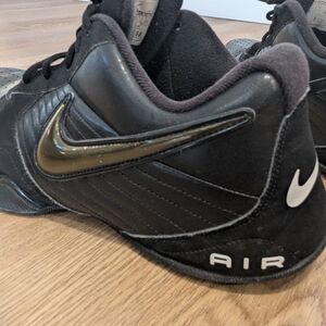 Nike Black Air Low-Top Sneakers with Gold Swoosh